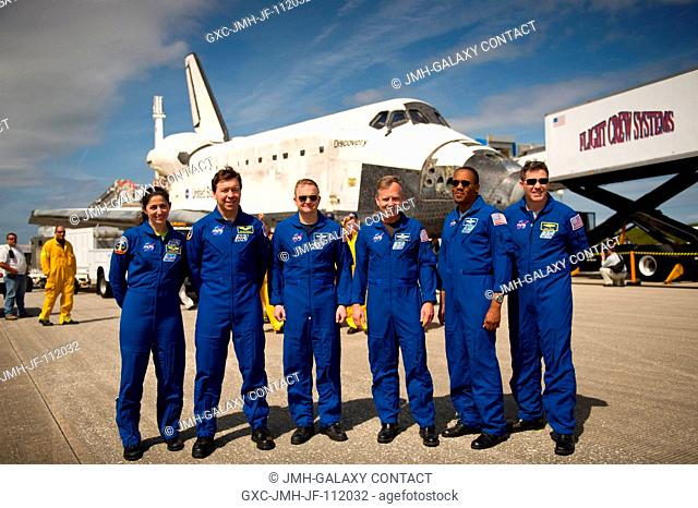 NASA astronauts, from left, Nicole Stott, Michael Barratt, both STS-133 mission specialists; Eric Boe, pilot; Steve Lindsey