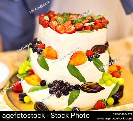 A traditional and decorative wedding cake at wedding reception
