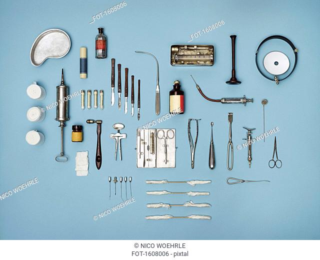 Directly above shot of medical tools on blue background