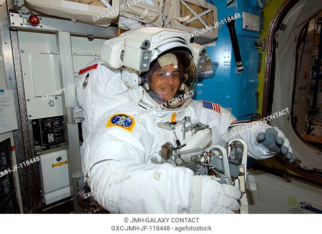 NASA astronaut Sunita Williams, Expedition 33 commander, is pictured in the Quest airlock of the International Space Station as she prepares for the start of a...