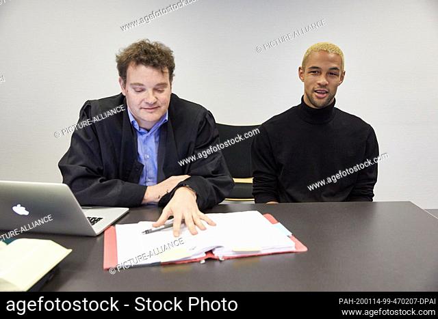 14 January 2020, Hamburg: The accused youtuber Simon Desue (r) and his lawyer Arne Timmermann sit in the district court of St