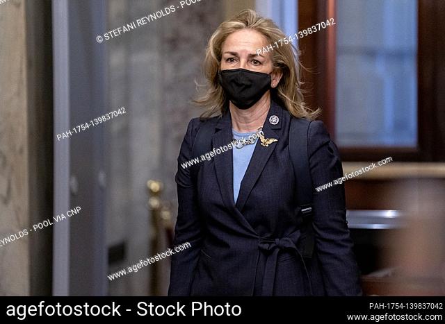 Representative Madeleine Dean, a Democrat from Pennsylvania, wears a protective mask while arriving to the U.S. Capitol in Washington, D.C., U.S