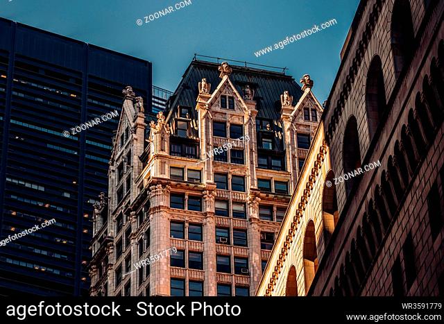 New York City - USA - Mar 11 2019: Close-up view of old and modern skyscrapers in Financial District Lower Manhattan New York City