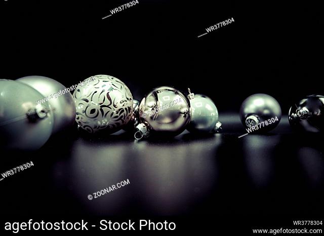 Cool holidays wallpaper background of Christmas decorations and balls or baubles on black background