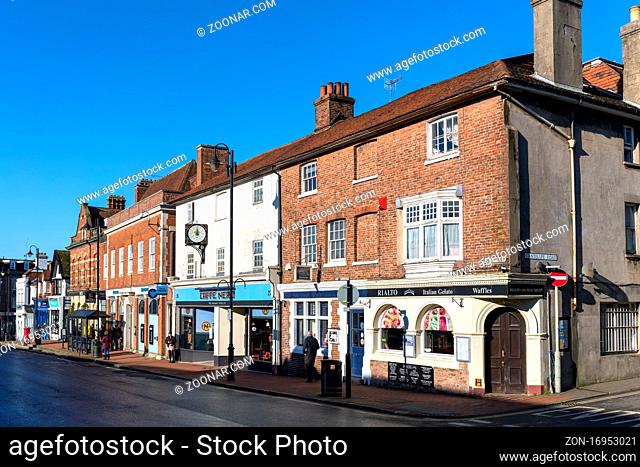 EAST GRINSTEAD, WEST SUSSEX, UK - JANUARY 25 : View of shops in the High Street in East Grinstead on January 25, 2021. Unidentified people