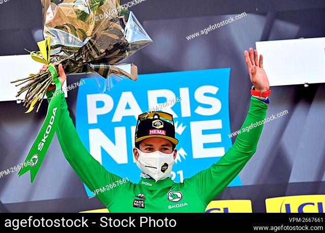 Slovenian Primoz Roglic of Team Jumbo-Visma celebrates on the podium in the green jersey of leader in the sprint ranking after the sixth stage of 79th edition...