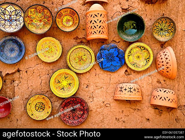 Colorful faience pottery dishes in a pottery workshop in Morocco