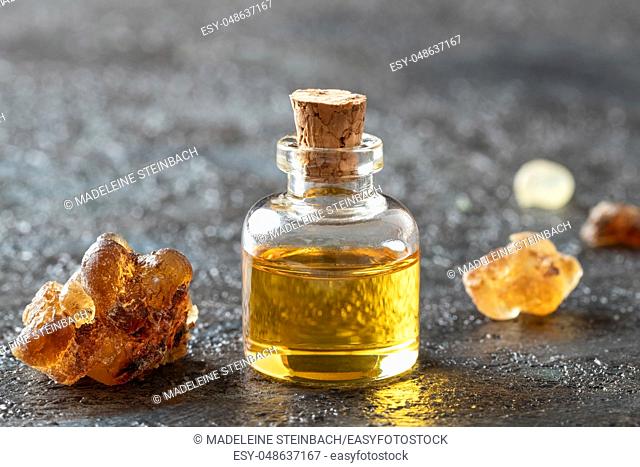 A bottle of frankincense essential oil and resin