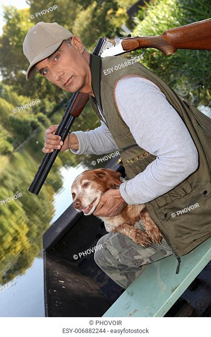 senior hunting with his dog
