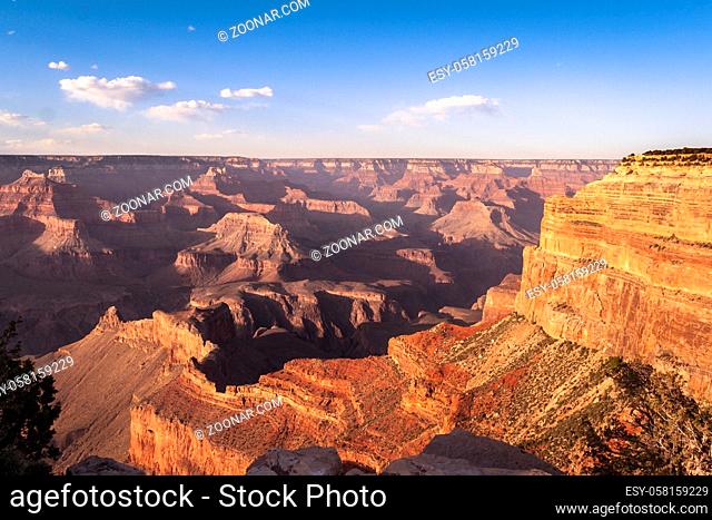 a man looking at the edge on the Grand Canyon, western USA