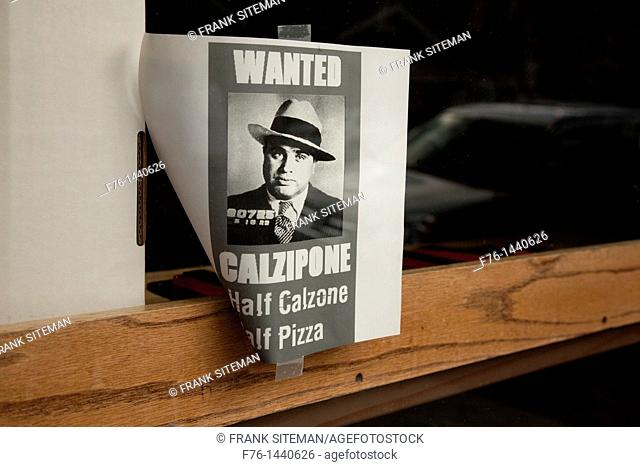 Advertisement for food, made from a calzone and a pizza and called a calzipone, capitalizing on the name of the famous gangster, Al Capone