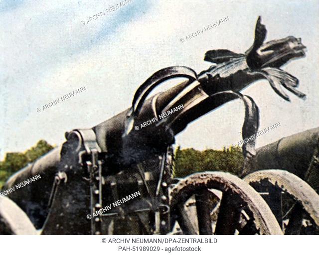 The contemporary colorized German propaganda photo shows a German canon destroyed by a premature burst explosion, date and location unknown (1914-1918)
