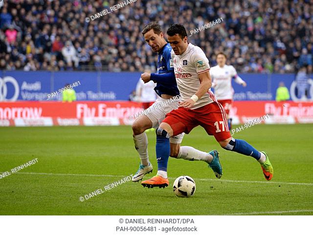 Hamburgs Filip Kostic (R) and Darmstadt's Sandro Sirigu vie for the ball during the German Bundesliga soccer match between Hamburg SV and Darmstadt 98 in the...