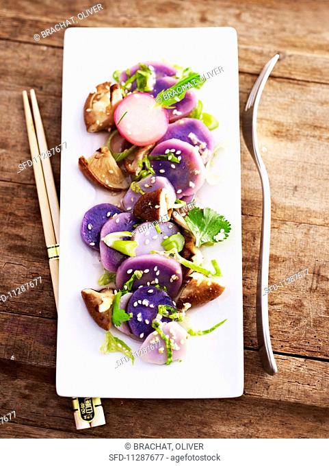 Oriental potato salad made with blue potatoes and shiitake mushrooms