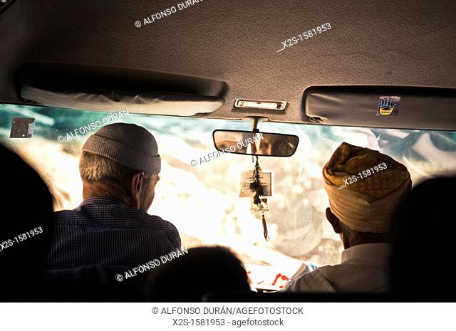 driver and passenger, Azilal, Morocco