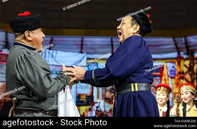 RUSSIA, MOSCOW - DECEMBER 12, 2023: Artists reenact traditional wedding rites on Kalmykia Republic Day as part of the Russia Expo international exhibition and...