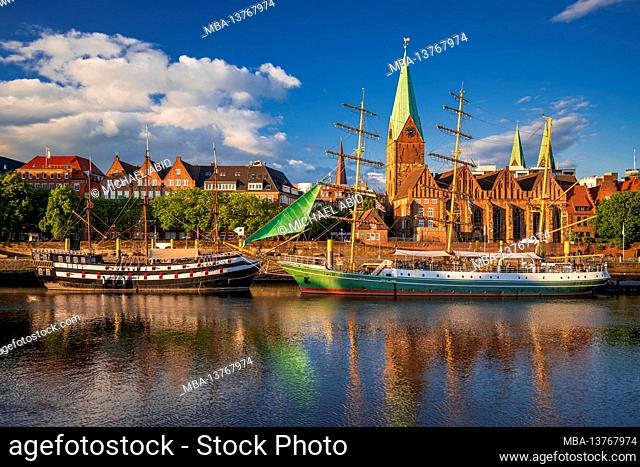 Historic town of Bremen with old sailing ships on Weser river, Germany