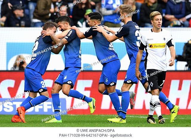 Hoffenheim's Dennis Geiger (l-r), goalscorer Kerem Demirbay, Nadiem Amiri and Stefan Posch celebrate taking a 1:0 lead during the Bundesliga soccer match...