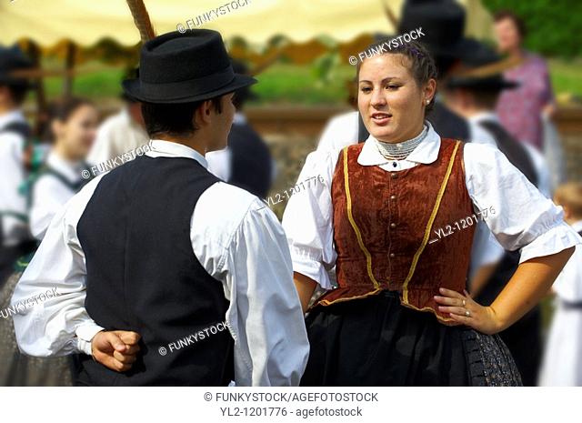 Hungarian folk dancers in tradtional Hungarian costume celebrating the wine festival - Badascony, Hungary