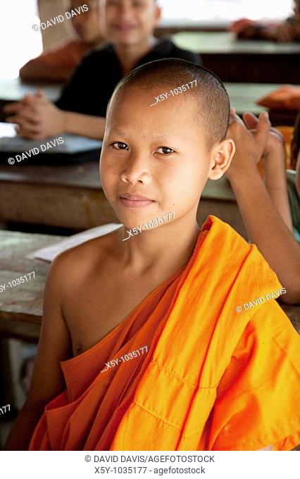 Young Buddhist Monk attending school in Cambodia