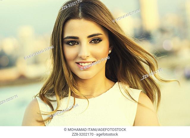 Beautiful woman smiling outdoors