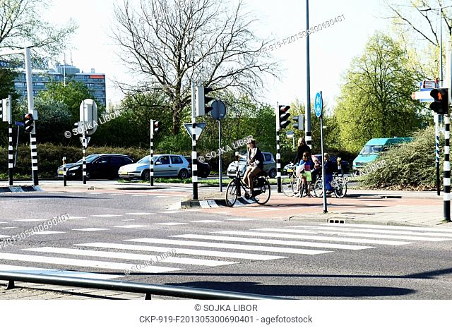 cycling path, road, pedestrian crossing, light, cross-roads, woman, children, Rotterdam, Netherlands on May 3, 2013 (CTK Photo/Libor Sojka)
