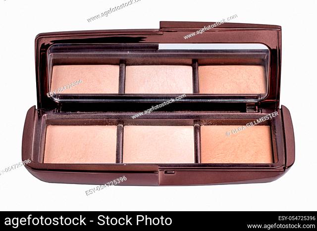 Cosmetic products isolated. Closeup of a elegant cosmetic box with cheek or face powder. Make-up isolated on a white background