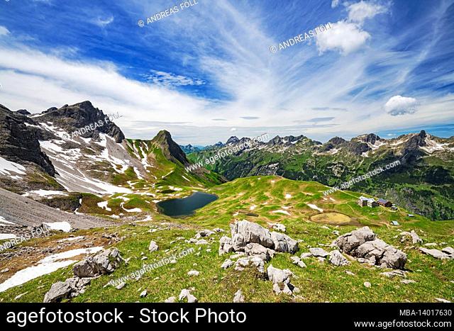 alpine mountain landscape with rappensee and rappenseehütte on a sunny summer day. allgäu alps, bavaria, germany, europe