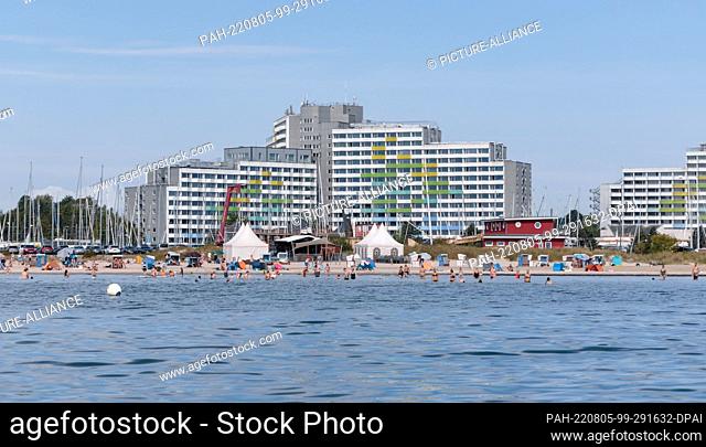 04 August 2022, Schleswig-Holstein, Damp: View of the south beach of Damp with the hotel ""Ostsee Resort Dampland"" in the background