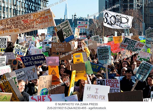 February 15, 2019 - London, England, United Kingdom - Thousands of young people gather in Parliament Square in central London to protest against the...
