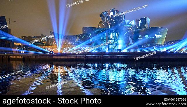 Bilbao, Spain. 11th Oct, 2017. Reflections, Spectacular Light over Guggenheim museum facade by Leo Warner