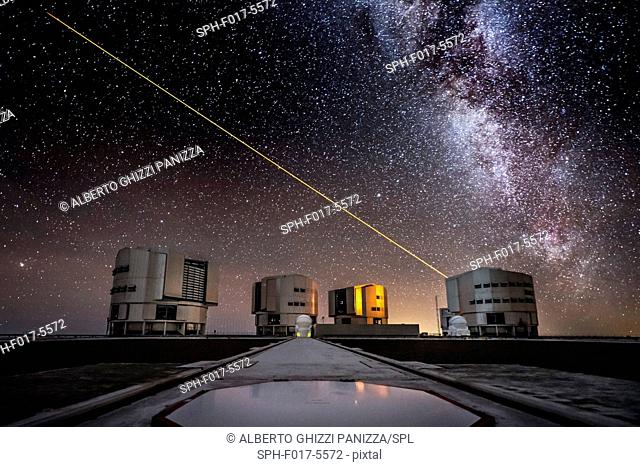 Laser beam from the UT4 telescope in the sky above the Paranal ESO observatory in Chile with the milky way in the background
