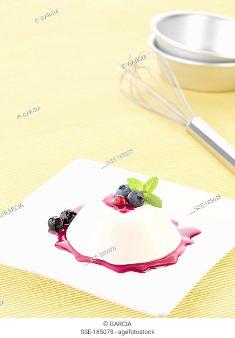 Panna cotta with pureed summer fruit