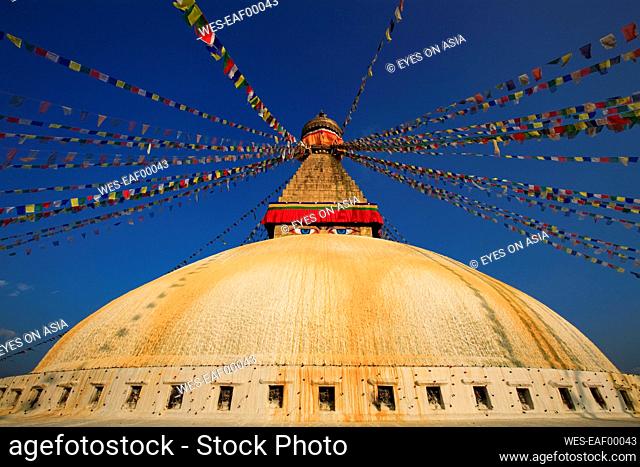 Nepal, ¶ÿBagmati¶ÿProvince, Kathmandu, Prayer flags hanging from top of¶ÿBoudhanath¶ÿstupa
