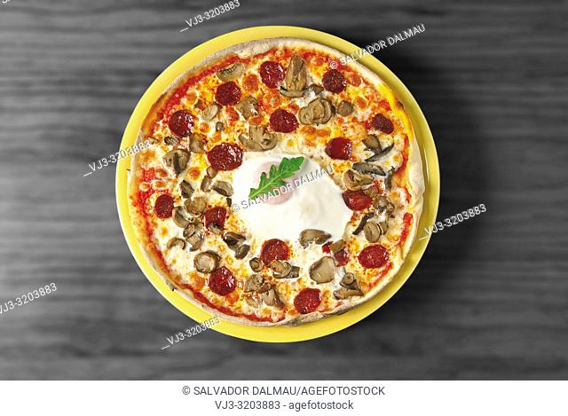 egg pizza with sobrasada and moshroom, studio photography girona, catalonia, spain,