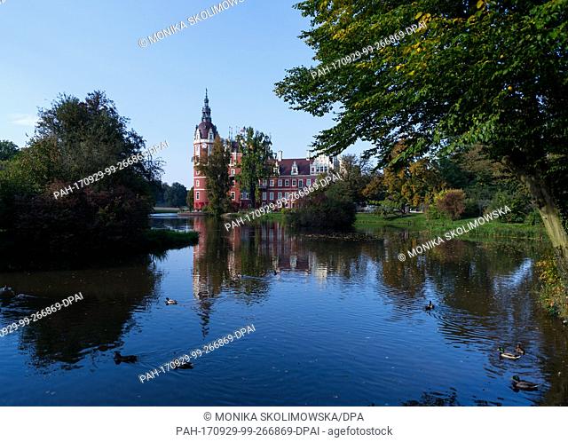 The Neues Schloss (lit. new castle) in the Fuerst-Pueckler-Park is reflected in a lake in Bad Muskau, Germany, 29 September 2017