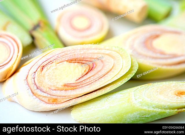 Fresh green lemongrass slices isolated on white background