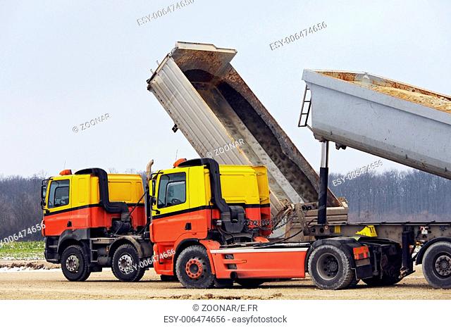 Two trucks on the site