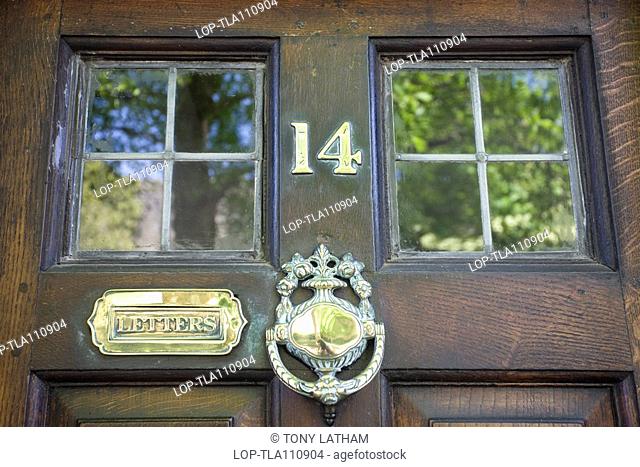 England, Shropshire, Ludlow, A traditional style front door and door furniture