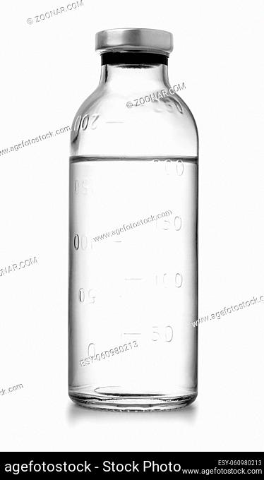 Glass bottle of medical saline solution isolated on white