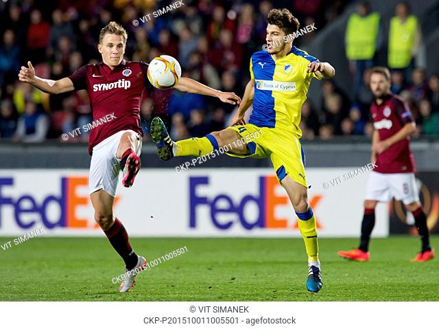 From left Borek Dockal of Sparta Praha and Kostakis Artymatas of APOEL fight for a ball during the second round, group K