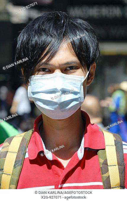 A Chinese man wearing mask, Hong Kong