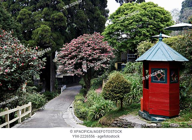 A red guard house at the Windamere Hotel in Darjeeling, India