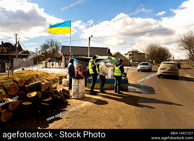 Checkpoint near Chernowitz, cars are stopped and checked by volunteers
