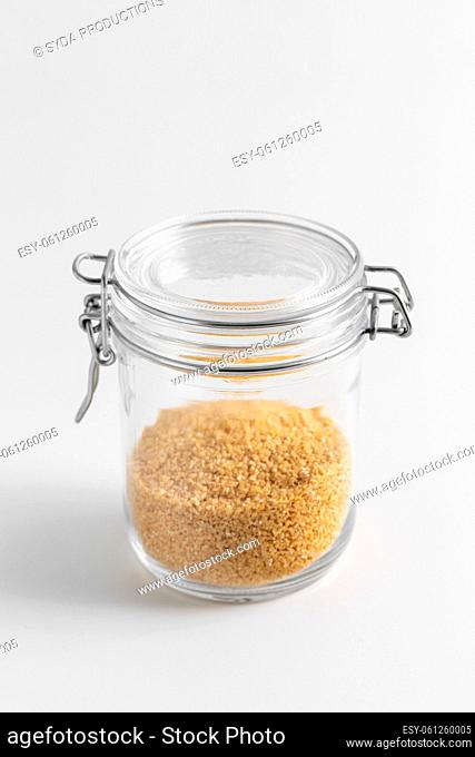 close up of jar with bulgur on white table