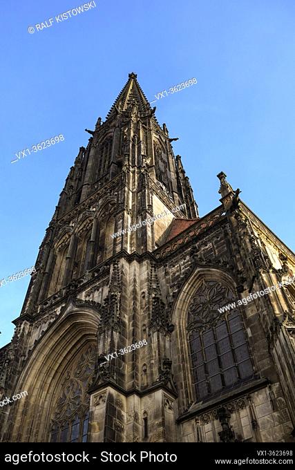 St. Lambert's Church, Muenster, Germany, steeple with cages of Muenster rebellion, famous ancient gothic church, tourist destination, Europe