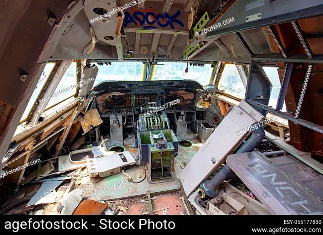 The interior of a derelict, vandalised aircraft in Bangkok, Thailand
