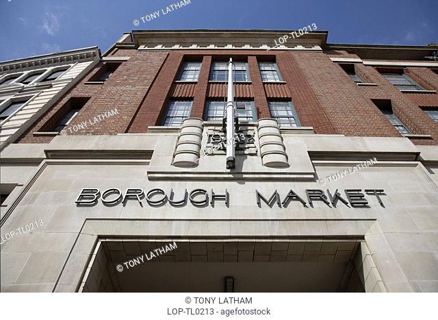 England, London, Borough Market, Looking up at the sign over the entrance to Borough Market