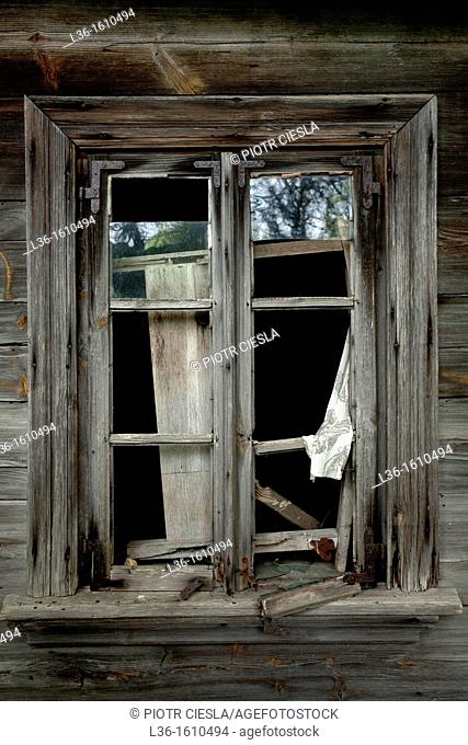 A window from a old abandoned farm house in Poland