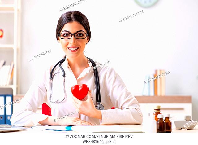 Young doctor in heart care concept